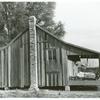 One of the sharecropper's houses with sweet potatoes and cotton on the porch; Knowlton Plantation, Perthshire, Mississippi Delta, Spring 1939.