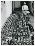 Mrs. Gus Wright, Farm Security Administration client with her canned goods, Oakland community, Greene County, Georgia, November 1941.