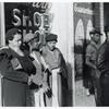 Domestic servants waiting for street car on way early in the morning. Mitchell Street, Atlanta, Georgia, May 1939.