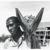 [An African American man with a shovel.]