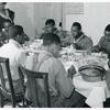 The Negro tenants and neighbors eating dinner after the white men have finished, on day of corn-shucking at Mrs. Fred  Wilkins' home. Tallyho, Stem, Granville County, No. Car., Nov 1939.
