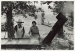 Skimming the boiling cane juice to make sorghum syrup at cane mill near Carr, Orange County, North Carolina, September 1939.