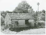 Former slave quarters now used as milk house on farm near Bardstown, Kentucky, August 1940.