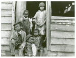Family of small landowner who moved out of the Santee-Cooper Basin, at their "new home" near Bonneau, South Carolina.