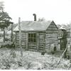 Pauline Clyburn, rehabilitation client at Manning, Clarendon County, South Carolina, with chicken house she made herself; The window she took from her own bedroom.