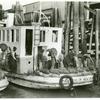 Unloading oysters from packet boat arriving at New Orleans, La.