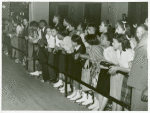 Crowds watching roller-skating exhibition, Chicago, Illinois.