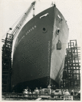 Bow-side view of Liberty ship SS George Washington Carver as it slides down the way, Richmond Shipyard No. 1