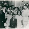 Descendants of the late Edward A. Savoy pose for the camera at the launching of Liberty ship SS Edward A. Savoy, Bethlehem-Fairfield Shipyard