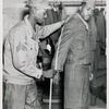 With the Eighth Army in Kobe, Japan, free, one-day fitting service at Kobe QM depot