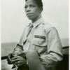 African American war correspondent aboard a U.S. Coast Guard ship