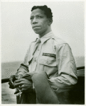 African American war correspondent aboard a U.S. Coast Guard ship