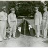 African American minister and his colleagues standing at a model chapel at Army show in nation's capital