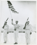 Color guard consisting of African Americans Corporal Gilbert Henderson, Staff Sergeant Edward W. Malone, and Sergeant John Pierce, Antiaircraft Artillery and Guided Missiles Center, Fort Bliss, Texas
