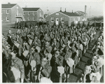 Members of the Women's Army Auxiliary Corps wearing gas masks and testing them for proper adjustment during a drill, First Women's Army Auxiliary Corps Training Center