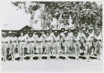 Members of an African American company of the Women's Army Auxiliary Corps lined up for review, Liberia