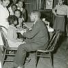 National Youth Administration youth assisting doctor in medical examination of children at the St. Simon's Center, Philadelphia