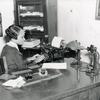 National Youth Administration youth working in office of the Superintendent of Nurses, Mercy Hospital, as typist