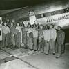 A group photograph of African American veterans with their veteran friends getting into a bus after flight, Washington, D.C.