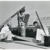 African American young men working on the roof