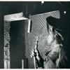 African American young female worker metalworking