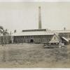 Back view of factory building.