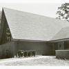 Exterior view of Riverdale branch with oblique view of peaked roof and windows
