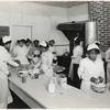 Howard Orphanage and Industrial School children learning how to bake.]