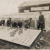Howard Orphanage and Industrial School children learning how to build greenhouses.]