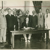 President Hoover in the hour of victory: signing the Naval Limitation Pact.