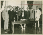 President Hoover in the hour of victory: signing the Naval Limitation Pact.
