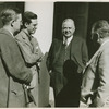 Ex-Pres. Hoover talking with three men.