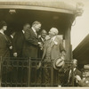 Herbert Hoover on a railroad car.