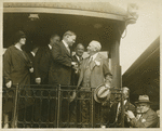 Herbert Hoover on a railroad car.