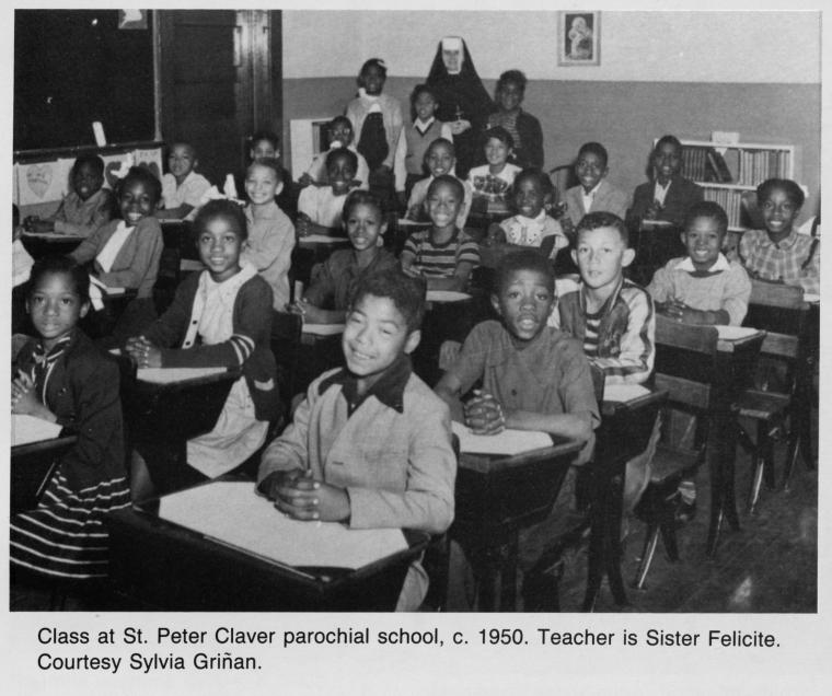 Class at St. Peter Claver parochial school, c. 1950. Teacher is Sister Felicite. Image ID: 1270335