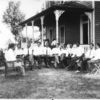 Group of African-American men on the front lawn, with [Channing H.] Tobias on the left.