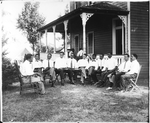 Group of African-American men on the front lawn, with [Channing H.] Tobias on the left.