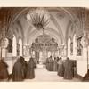 Interior view of a church with a group of nuns
