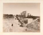 General view of a church surrounded by a wall