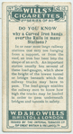 Do you know why a curved iron hangs over the rails in many stations?