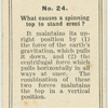 What causes a spinning top to stand erect?