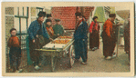 An applevendor in native attire, Volendam.