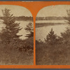 View on the shore, beach home visible on left.