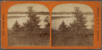 View on the shore, beach home visible on left.
