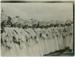 Group of women in native costumes.