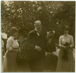 Man and two women, outdoors