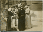 Group of delegates and a street vendor.