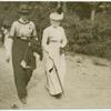 Two women walking.