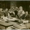 Mothers and their babies waiting to talk to a physician.
