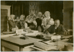 Mothers and their babies waiting to talk to a physician.